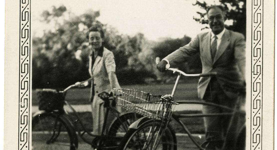 Dorothy Van Dyke Leake and her husband, Harold, riding bicycles on July 4, 1943, in Stillwater, Oklahoma.