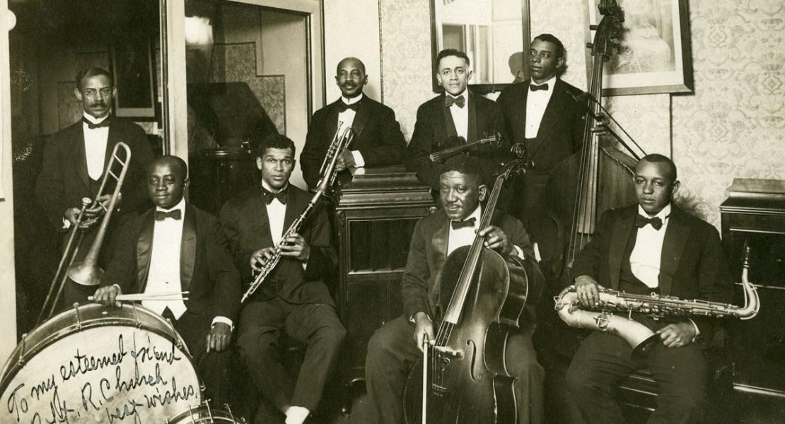 W. C. Handy (fourth from left, with trumpet) and band members, c. 1918. [University of Memphis Libraries, Special Collections Department, Robert R. Church Family Papers]  