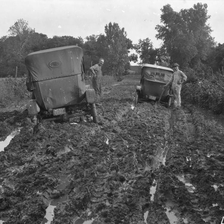 A muddy road in Lafayette County, Missouri, circa 1910s. At the dawn of the automobile era, the predicament of drivers in Missouri and elsewhere sparked a nationwide Good Roads Movement. [State Historical Society of Missouri, Leonard D. and Marie H. Rehkop Collection of Algert T. Peterson Photographs, C3888-G0043]