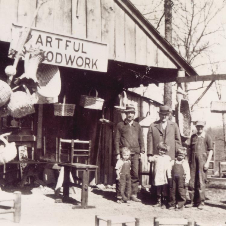 Henry J. Childers (left) and his children Bonnie, Bernice, Elbert, and Raymond help a customer at the family’s shop in Clementine, Missouri. [Phelps County Historical Society, Elbert I Childers Collection]
