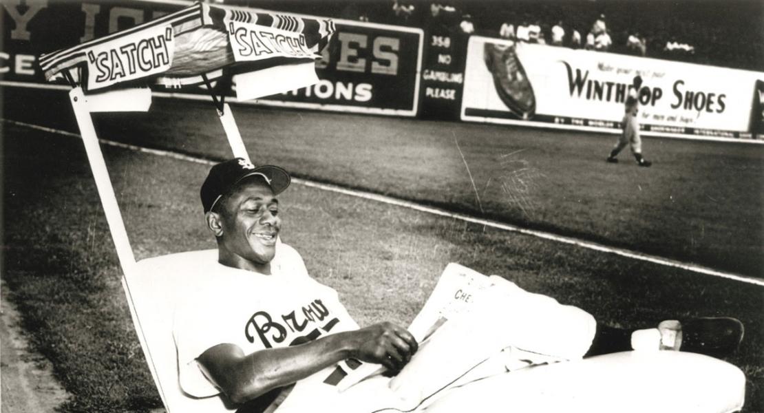 Satchel Paige awaits his manager’s call to the bullpen, 1952. [Missouri Historical Society, St. Louis, Photographs and Prints Collection, N22475]