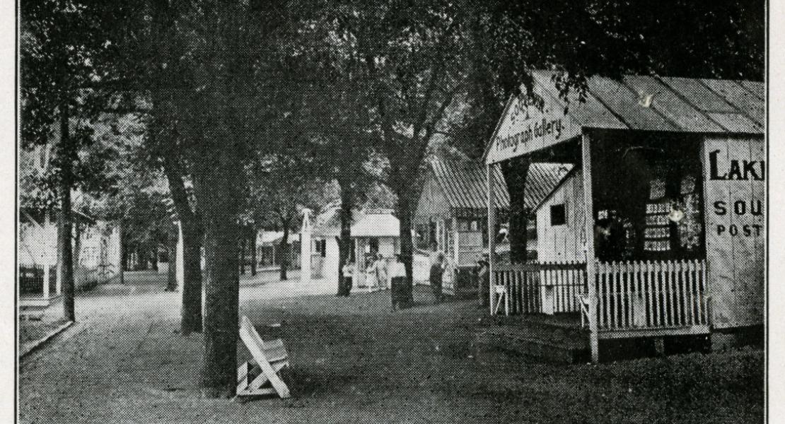 A scene from Lakeside’s Midway. At the immediate right is a gallery where visitors could have their photo taken. [State Historical Society of Missouri, Missouri Council of Defense Papers (C2797)]