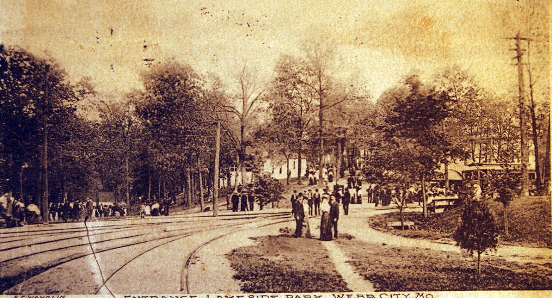 Visitors and trolley tracks at the entrance to Lakeside Park. [Courtesy of the Joplin Historical & Mineral Museum]