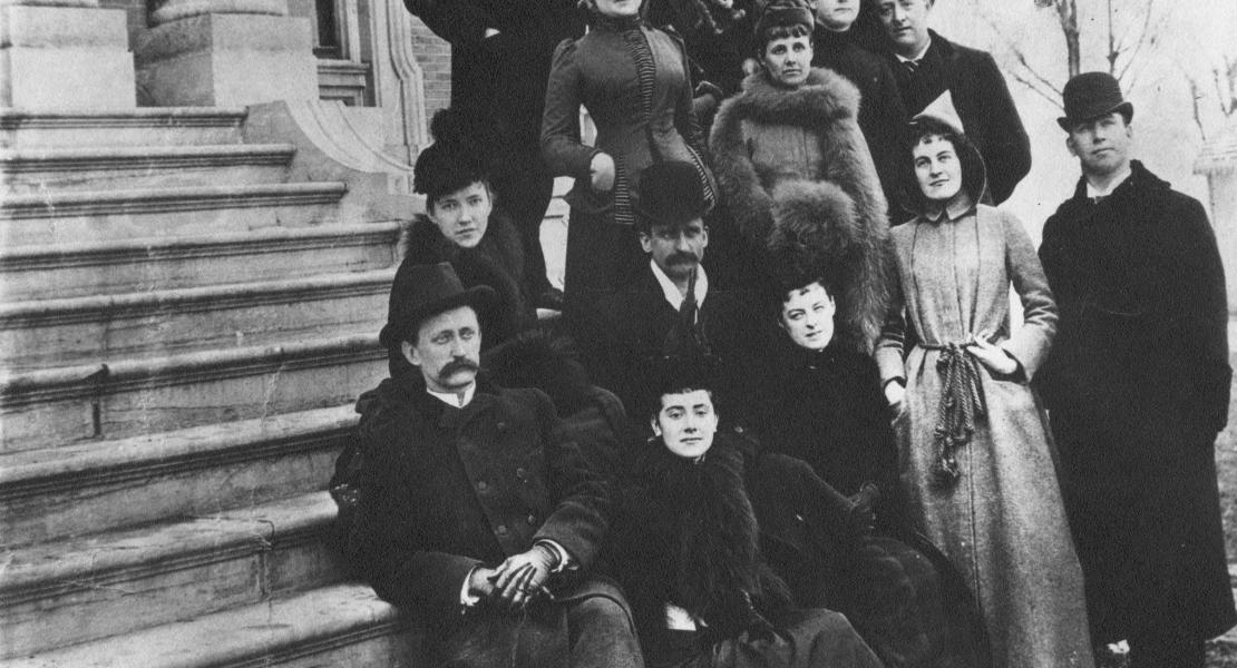 A group photo of one of the first house parties entertained by Governor Francis, on the steps of the Governor’s Mansion. Francis is seated at bottom left; Jane (Perry) Francis, his wife, is standing at center in the second row. [State Historical Society of Missouri, Women of the Mansion Photograph Collection, P0536]