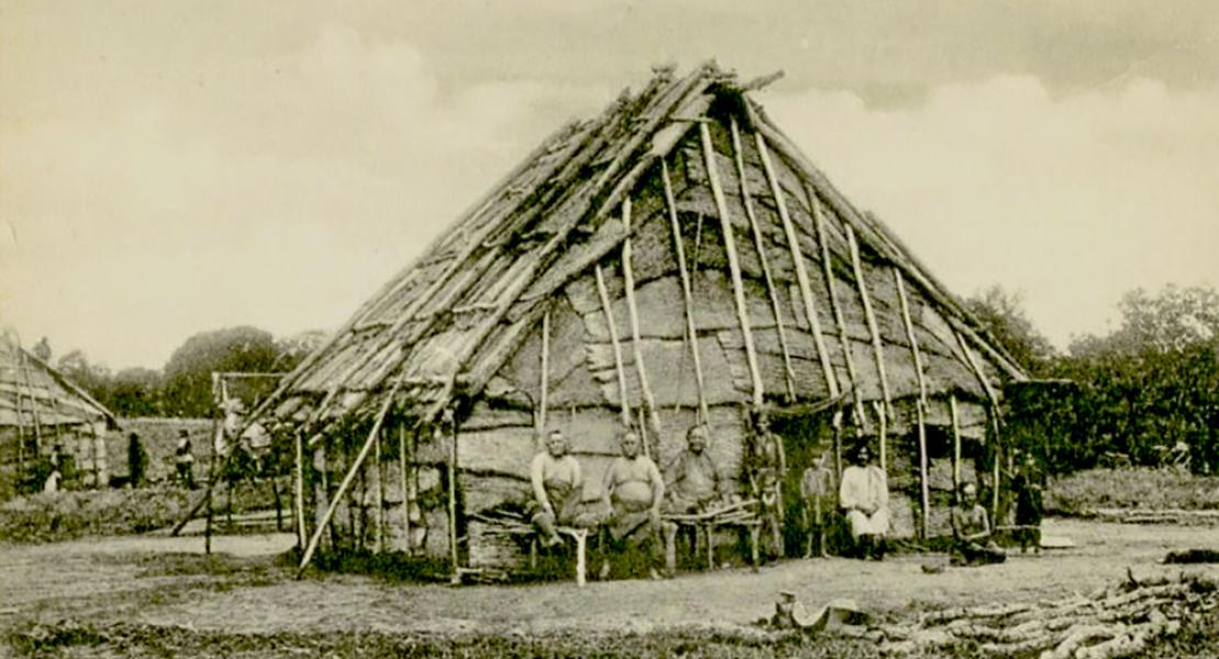 Sac and Fox bark house by William Prettyman, ca. 1889. [Postcard from the collection of Michael Dickey]