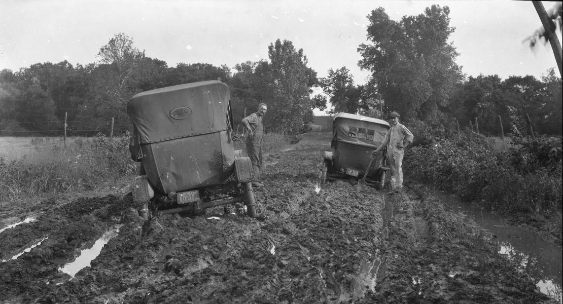 A muddy road in Lafayette County, Missouri, circa 1910s. At the dawn of the automobile era, the predicament of drivers in Missouri and elsewhere sparked a nationwide Good Roads Movement. [State Historical Society of Missouri, Leonard D. and Marie H. Rehkop Collection of Algert T. Peterson Photographs, C3888-G0043]