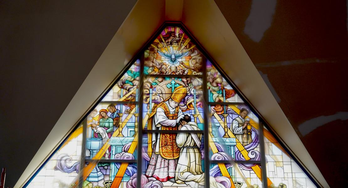 The stained-glass window commemorating Father Tolton in the Cathedral of St. Joseph, Jefferson City, Missouri. [Diocese of Jefferson City]