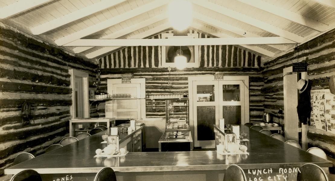 The lunch room at Log City. [State Historical Society of Missouri, John F. Bradbury Jr. Postcard Collection, R1551]