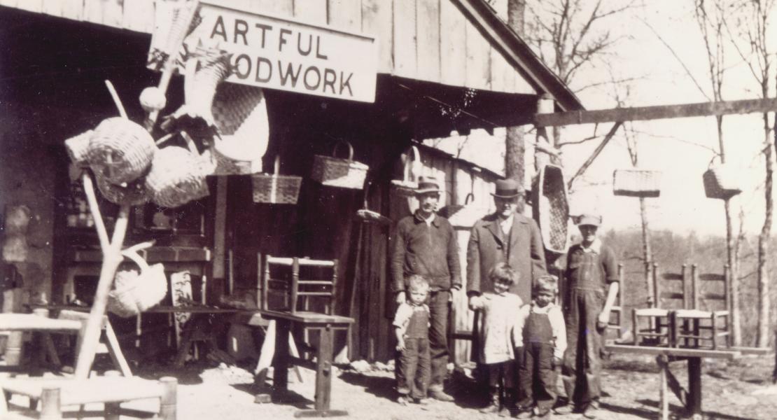 Henry J. Childers (left) and his children Bonnie, Bernice, Elbert, and Raymond help a customer at the family’s shop in Clementine, Missouri. [Phelps County Historical Society, Elbert I Childers Collection]