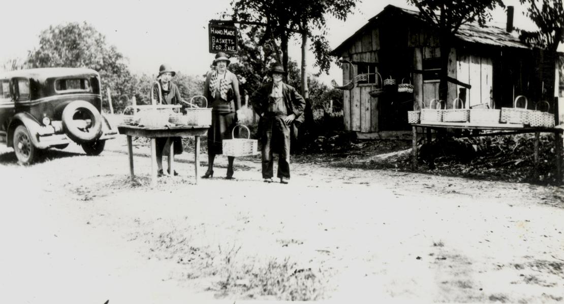William Childers (right) with customers along Route 66 at Clementine, Missouri. [Phelps County Historical Society, Elbert I Childers Collection]