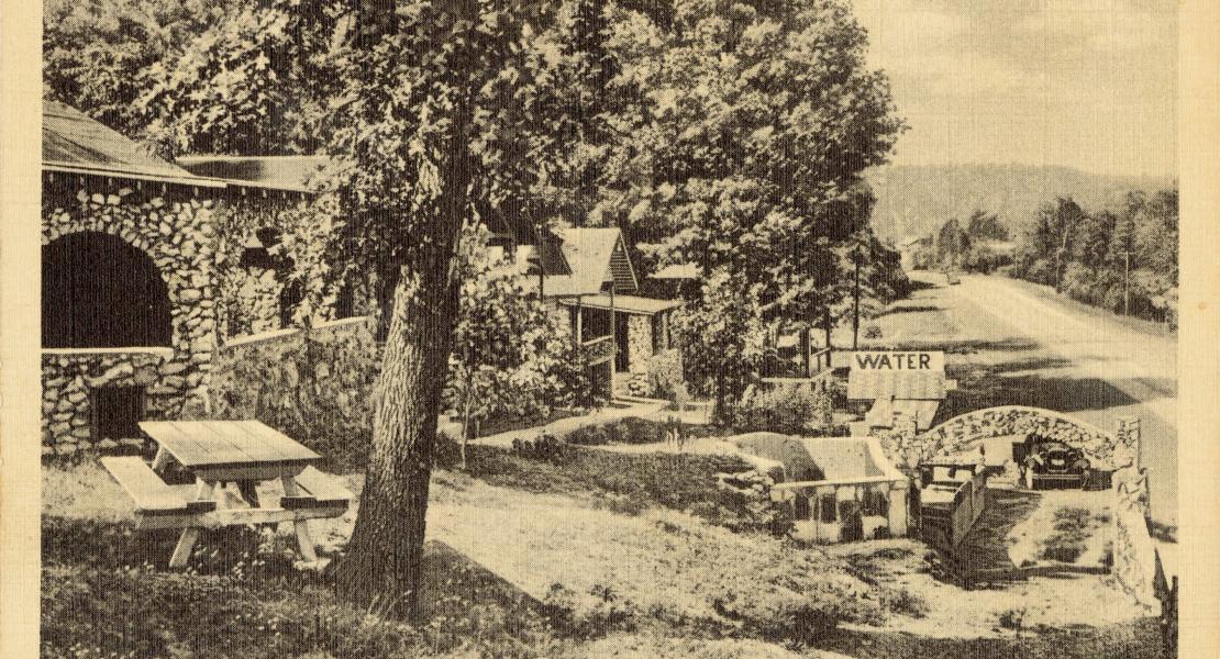 Stony Dell was located on both sides of Route 66; this view of the cabins shows the north side of the complex. [State Historical Society of Missouri, John F. Bradbury Postcard Collection, R1551]