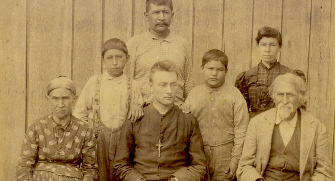 Seated left to right: Eliza Splitlog, Father William Henry Ketcham, and Mathias Splitlog. Standing behind Father Ketchum may be the Splitlogs’ son Henry B. Splitlog, c. 1892. [Oklahoma Historical Society, Ella Ketcham Collection, 17497]
