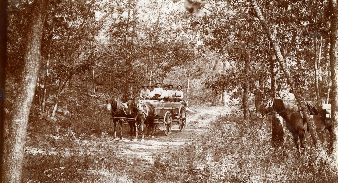 A johnboat being transported by wagon in Taney County, Missouri. [State Historical Society of Missouri, Johnson Family Papers Collection, SP0085]