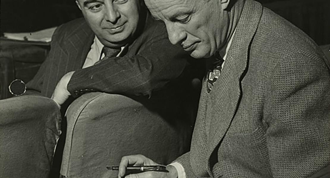 Robert Russell Bennett (right) with Salvatore Dell’Isola at rehearsals for the Broadway production of South Pacific. Bennett served as orchestrator for the show, and Dell’Isola as musical director. [New York Public Library Digital Collections, Billy Rose Theatre Collection Photograph File, TH-52233]