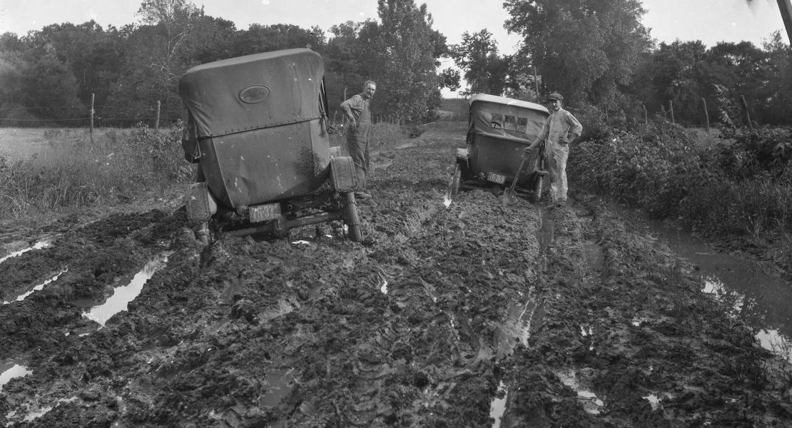 A muddy road in Lafayette County, Missouri, circa 1910s. At the dawn of the automobile era, the predicament of drivers in Missouri and elsewhere sparked a nationwide Good Roads Movement. [State Historical Society of Missouri, Leonard D. and Marie H. Rehkop Collection of Algert T. Peterson Photographs, C3888-G0043]